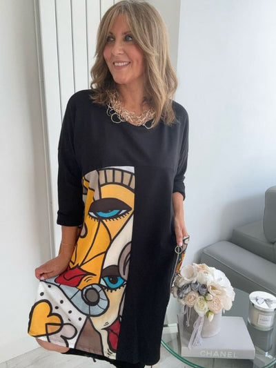 Oversized multicolour Picasso print dress with relaxed loose fit, made from soft breathable fabric. One size fits UK 10–20, inspired by abstract art, perfect for casual wear or travel.