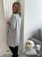 Oversized multicolour Picasso print dress with relaxed loose fit, made from soft breathable fabric. One size fits UK 10–20, inspired by abstract art, perfect for casual wear or travel.