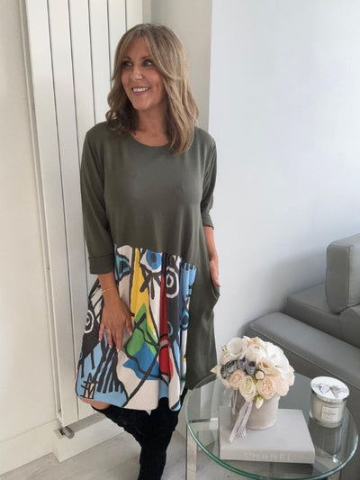 Oversized multicolour Picasso print dress with relaxed loose fit, made from soft breathable fabric. One size fits UK 10–20, inspired by abstract art, perfect for casual wear or travel.