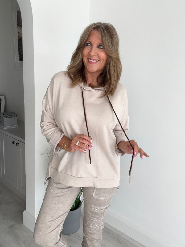 Women’s casual hooded top with drawstring, free size fit (UK 10–18), available in multiple colours, designed for everyday casual wear and layering.