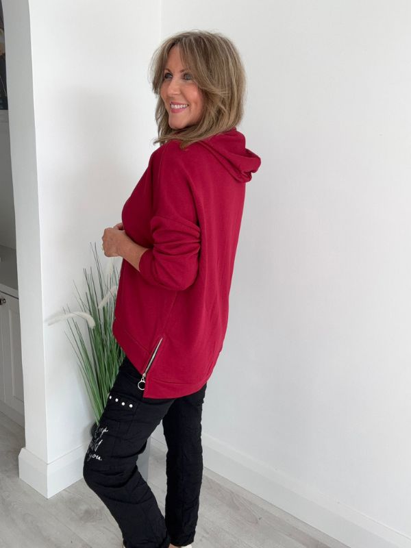 Women’s casual hooded top with drawstring, free size fit (UK 10–18), available in multiple colours, designed for everyday casual wear and layering.