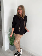 Women’s casual hooded top with drawstring, free size fit (UK 10–18), available in multiple colours, designed for everyday casual wear and layering.
