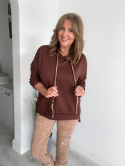 Women’s casual hooded top with drawstring, free size fit (UK 10–18), available in multiple colours, designed for everyday casual wear and layering.