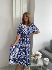 Flowy zebra print wrap dress for UK sizes 14–24 styled with heels