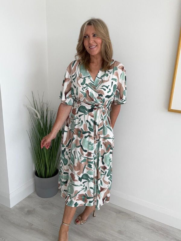 Abstract wrap dress for sizes 14–24 with adjustable waist tie and V-neckline