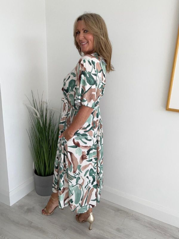Abstract wrap dress for sizes 14–24 with adjustable waist tie and V-neckline
