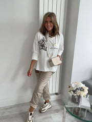 Star Leopard Print Hoodie in White with leopard star detail and drawstring hood
