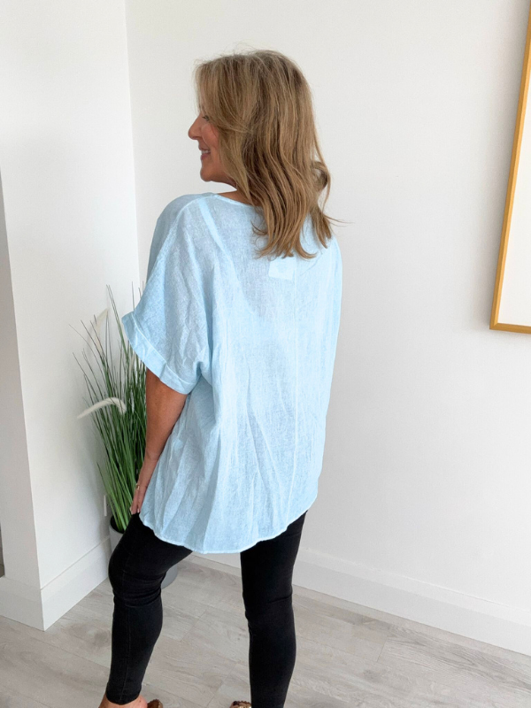 Brushed cotton and linen embroidered top with short sleeves and relaxed fit, displayed flat on neutral background