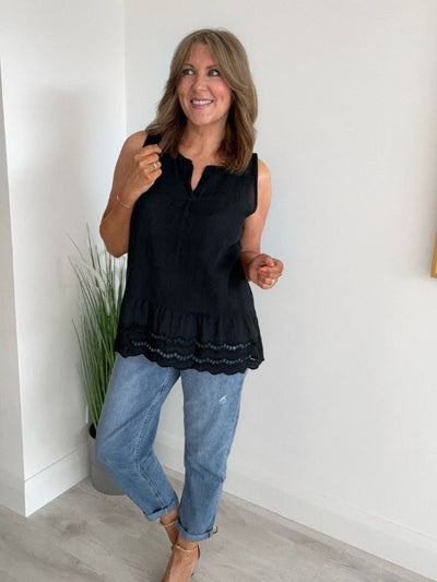 Sleeveless cotton vest top with delicate broderie anglaise hem, available in Light Denim Blue, Chocolate Brown, and Classic Black. Lightweight and breathable A-line silhouette in sizes 8–18, perfect for summer styling.