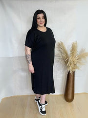 Model wearing AUSELILY Women's Summer Maxi Dress featuring short sleeves, side slit, rounded neck, and functional pockets – Comfortable and Casual Summer Outfit