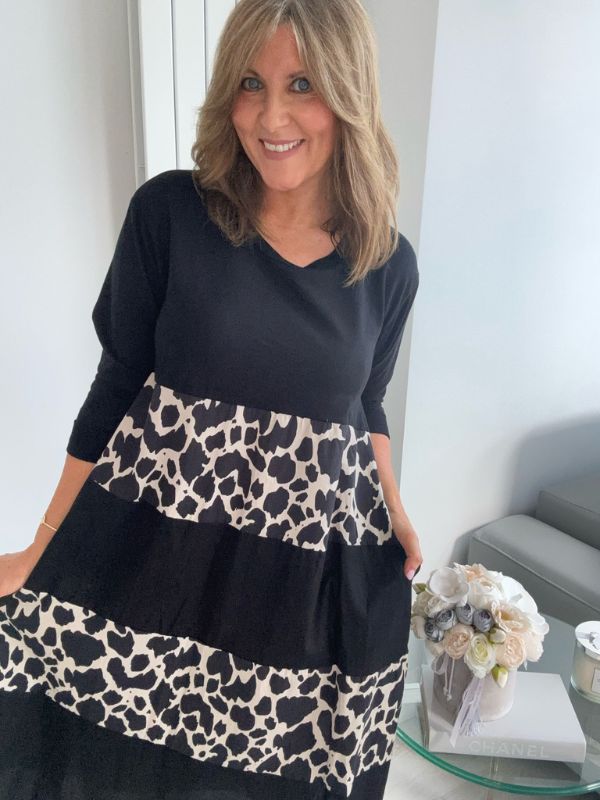 Black and animal print tiered midi dress with 3/4 sleeves, lightweight fabric, and flattering loose fit, suitable for UK sizes 8–18