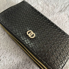 Luxury woven faux leather 2-zip purse with hand strap, crystal-embellished emblem, and spacious compartments for cash, cards, coins, and phone.