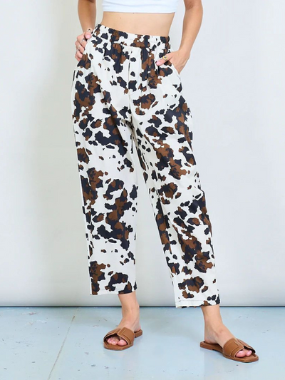 Bold animal splash print tapered trousers in brown and white, free size 8–20