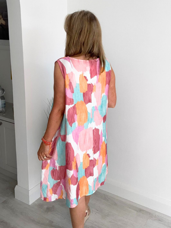 Printed sleeveless mini dress with A-line fit and side pockets – lightweight and breathable, free size fits 8–20