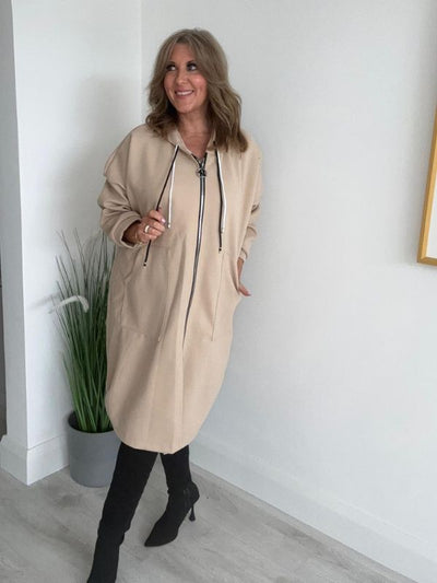 Women’s Curvy Range oversized coat, free size fits 18–24. Features a relaxed zip-up front, large pockets, and drawstring hood.