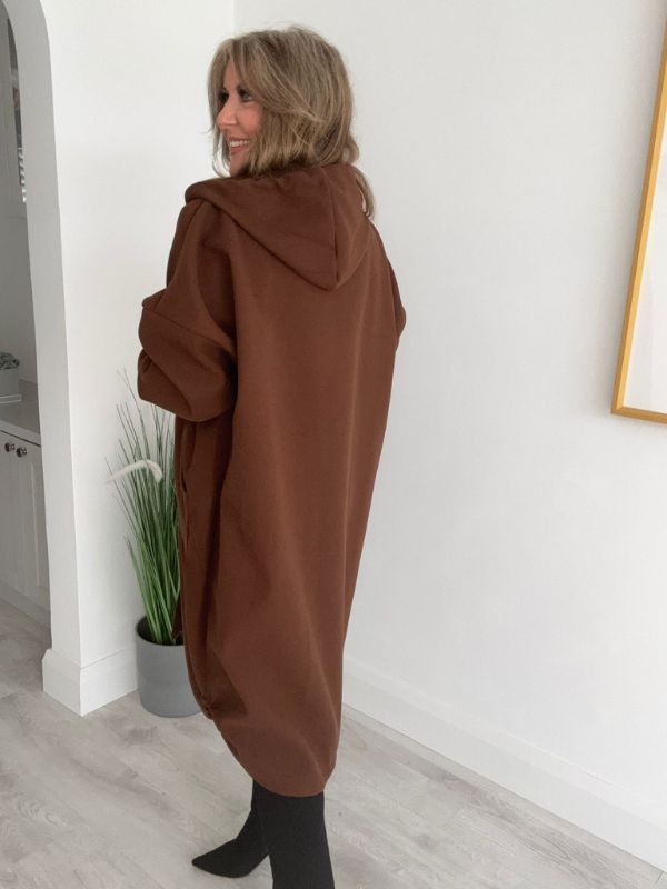 Women’s Curvy Range oversized coat, free size fits 18–24. Features a relaxed zip-up front, large pockets, and drawstring hood.