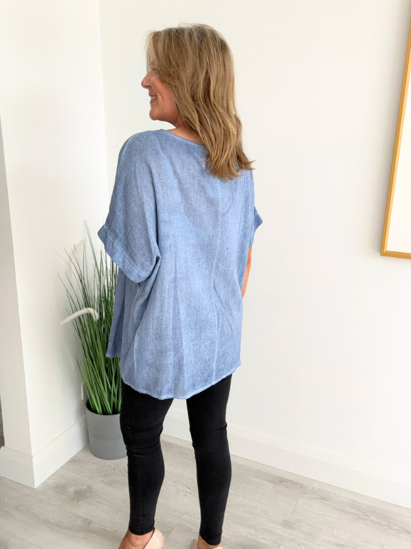 Brushed cotton and linen embroidered top with short sleeves and relaxed fit, displayed flat on neutral background