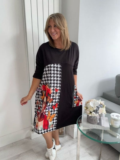 Frida Kahlo-inspired oversized tunic dress featuring artistic printed panels with houndstooth, butterfly motifs, and a portrait, styled for UK sizes 8–20 with adjustable drawstrings and side pockets.