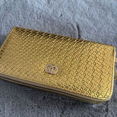 Luxury woven faux leather 2-zip purse with hand strap, crystal-embellished emblem, and spacious compartments for cash, cards, coins, and phone.