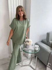 Light Scuba Co-Ord Set made from soft, breathable scuba fabric, available in five colours: navy, khaki, winter white, powder blue, and pink. Two-piece relaxed fit outfit available in Size 1 (UK 10–16) and Size 2 (UK 18–22), designed for all-day comfort and effortless style.