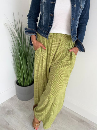Women's vintage geometric wide-leg pants in breathable fabric with box print, elastic waistband, and relaxed free-size fit (UK 8–20). 