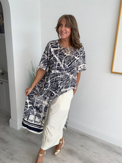 Model wearing vintage city map print tunic with asymmetrical hemline – free size 8-20"