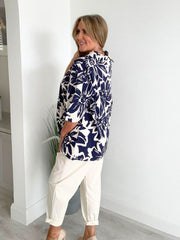 Watercolor floral print loose blouse with classic collar, available in navy and baby blue, free size 8–18