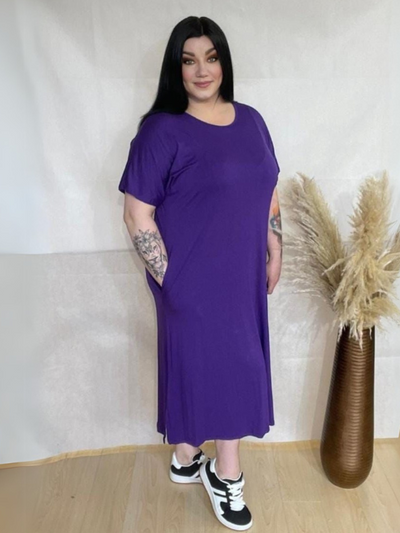 Model wearing AUSELILY Women's Summer Maxi Dress featuring short sleeves, side slit, rounded neck, and functional pockets – Comfortable and Casual Summer Outfit