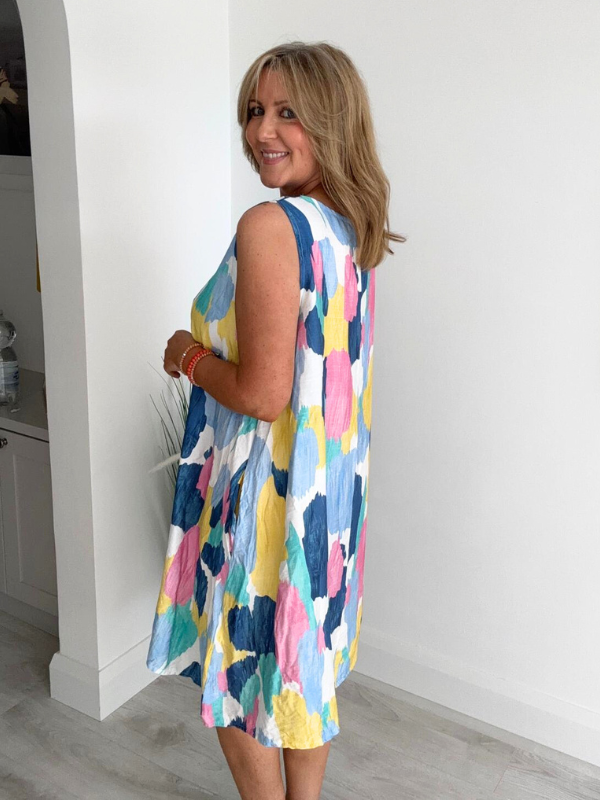 Printed sleeveless mini dress with A-line fit and side pockets – lightweight and breathable, free size fits 8–20