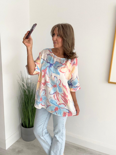 Silk satin floral print top with oversized fit, round neckline, and elbow-length sleeves – available in Blush Mix and Mint Mix colorways – fits UK sizes 8–18.