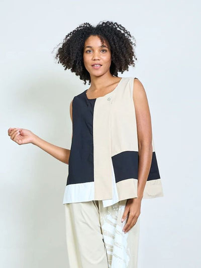 Geometric panel sleeveless asymmetric top with front flap and button detail