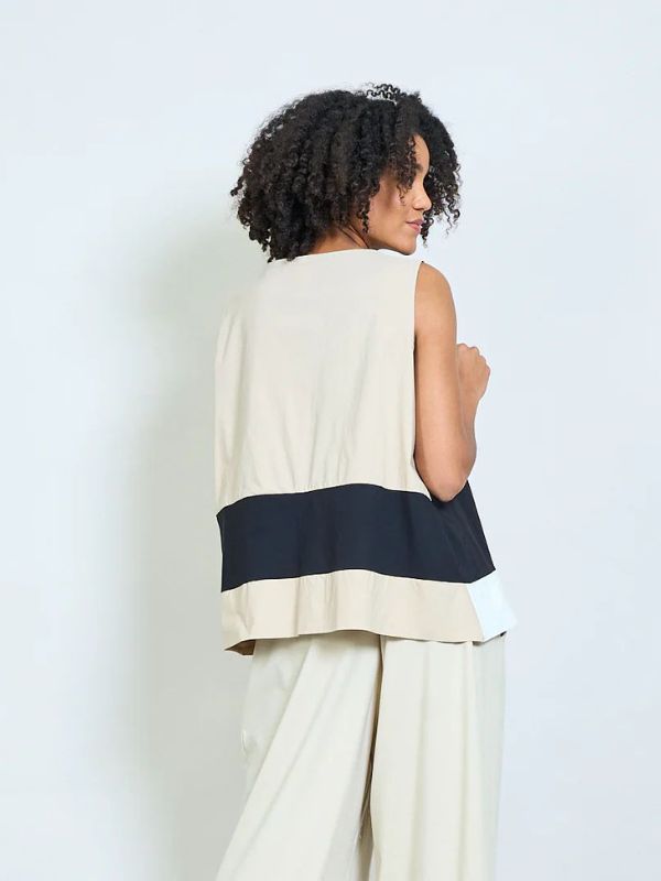 Geometric panel sleeveless asymmetric top with front flap and button detail