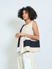 Geometric panel sleeveless asymmetric top with front flap and button detail