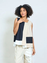 Geometric panel sleeveless asymmetric top with front flap and button detail