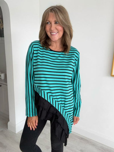 Vintage-style teal and black striped tunic with asymmetric hem and layered ruffle detail, long ruched sleeves, and relaxed fit. One size fits UK 8–18.