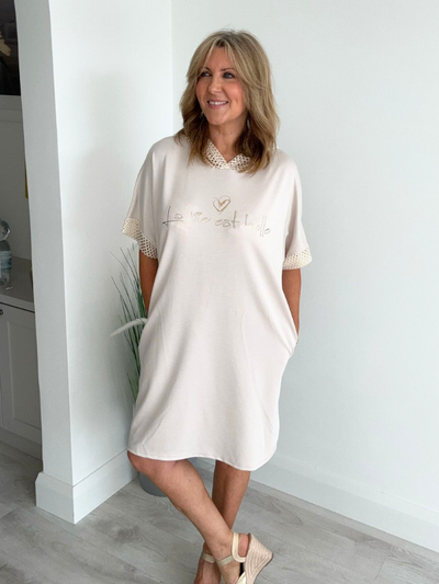 Casual midi-length hoodie dress with half sleeves, crochet detail hood, and side pockets – free size 8–16