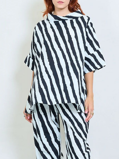 Oversized zebra print blouse with cowl neck and high-low hem